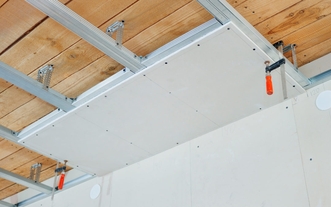 Ceiling panel fitting on metal grid framework - Mike Coating & Maintenance project